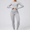 Back Crisscross Round Neck Long Sleeve Top and Leggings Active Set